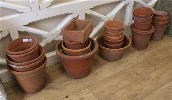 A quantity of terracotta pots, various sizes